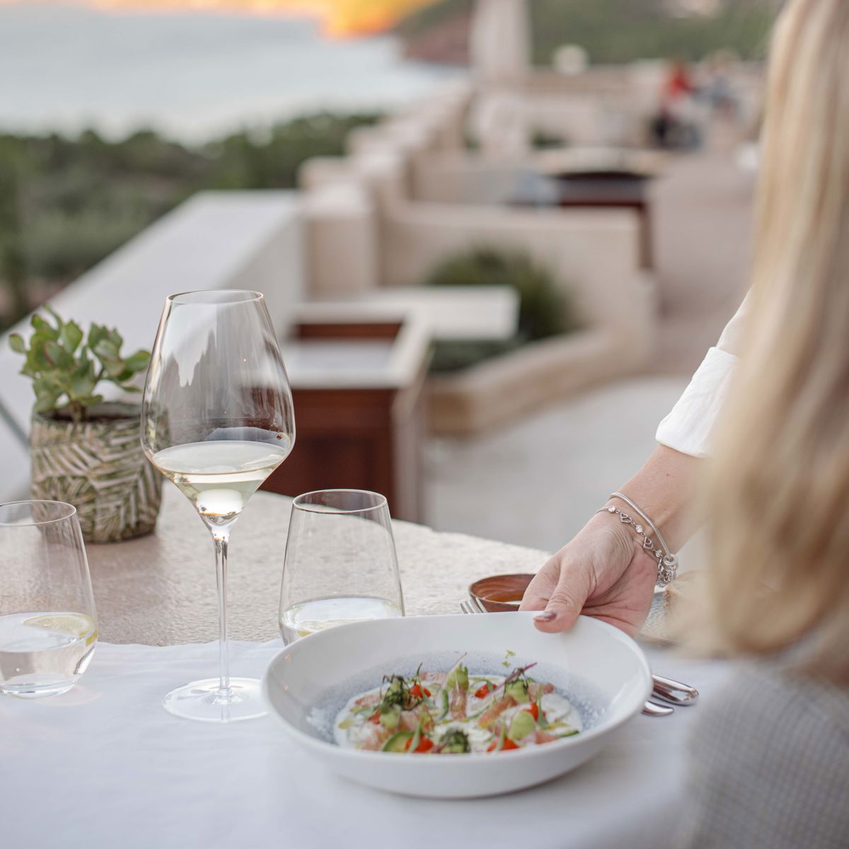 Staff serving guest their meal